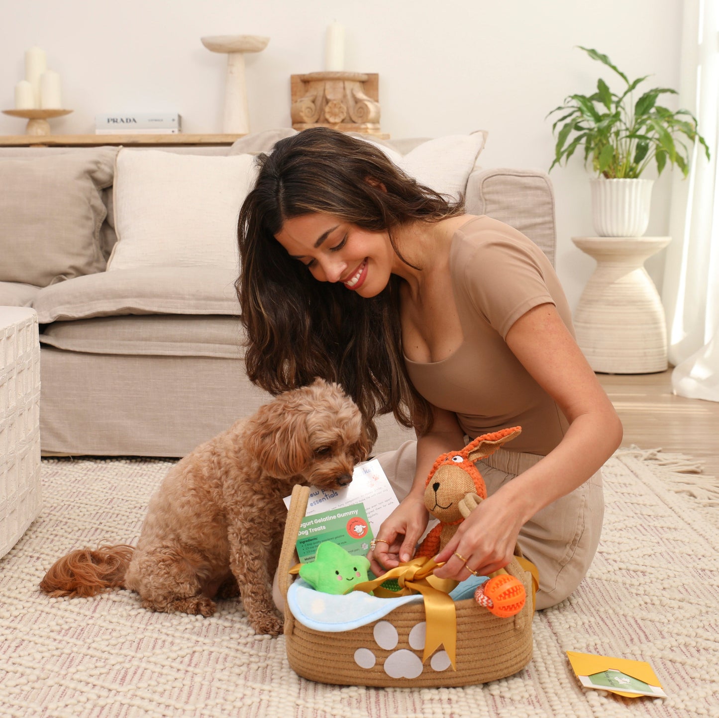 Dog mum unboxing new puppy gift basket